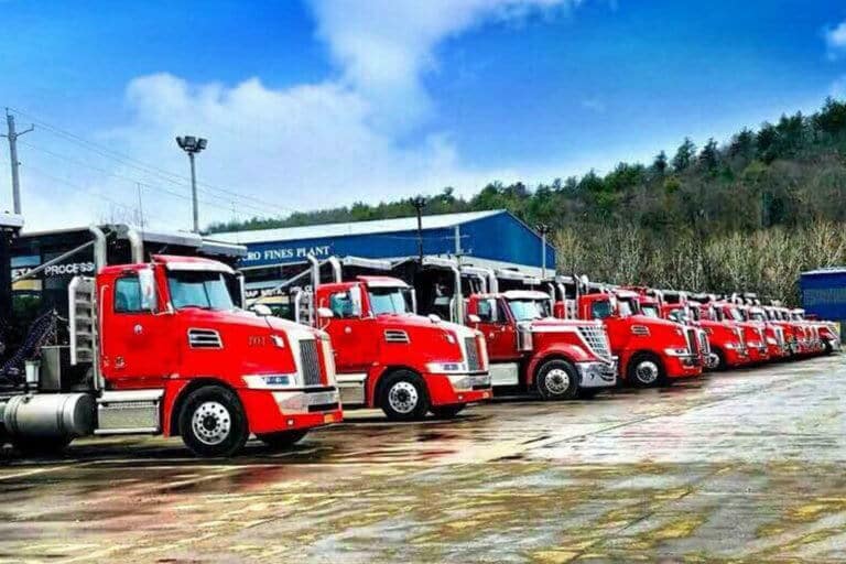 The fleet at Upstate Shredding's Scrap Steel Processing Plant