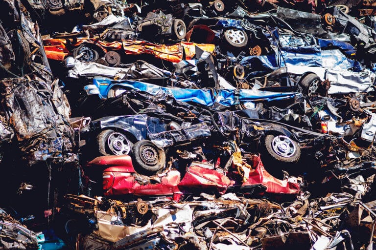 A pile of cars that will be recycled at Upstate Shredding